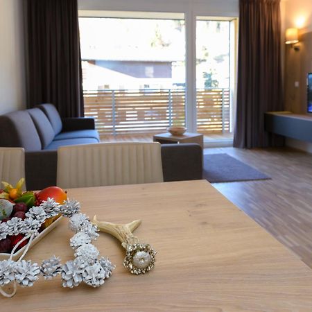 Appartementhotel Sonnenhof Kossen Bagian luar foto