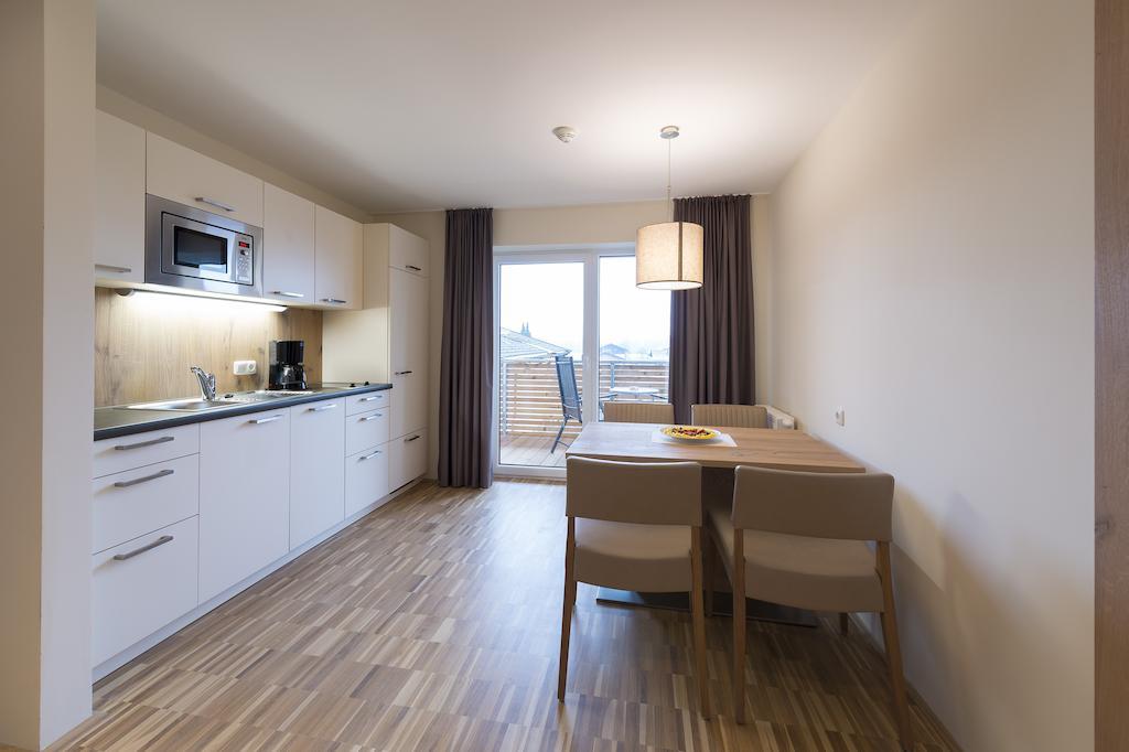 Appartementhotel Sonnenhof Kossen Ruang foto
