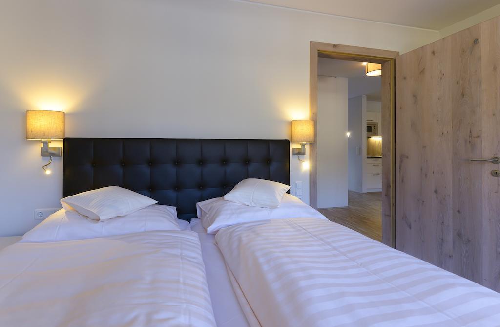 Appartementhotel Sonnenhof Kossen Bagian luar foto