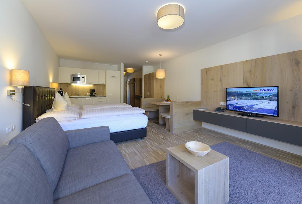 Appartementhotel Sonnenhof Kossen Ruang foto